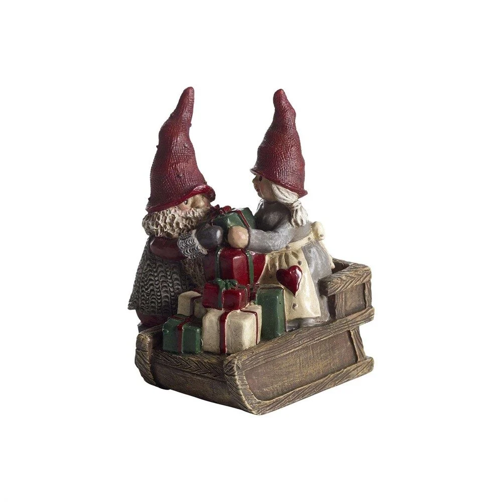 Tomten håkan och stina med släde